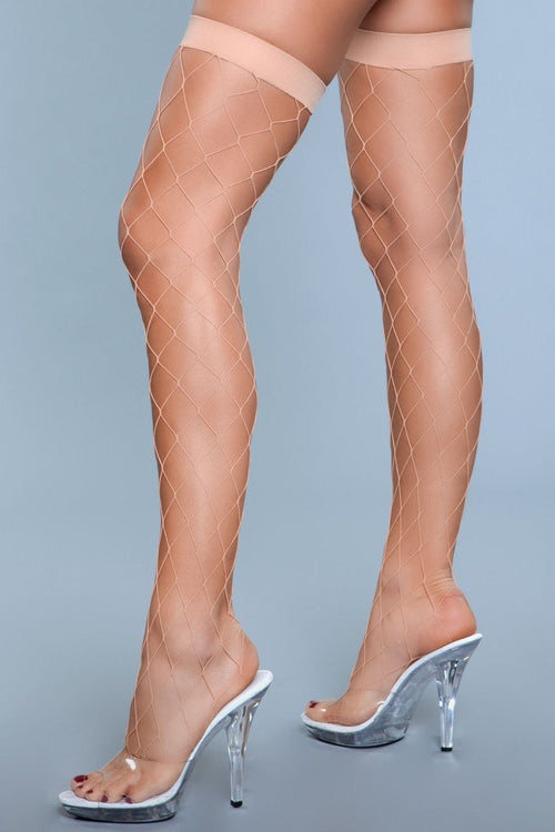 Boldly Walk in Fishnet Thigh Highs