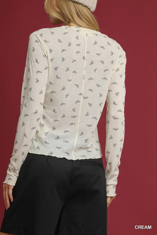 Lila's Bow-Print Knit Top Adventure