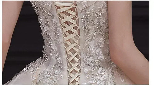 Luxury Off-Shoulder Wedding Dress - Handmade Lace Ball Gown | Femstylo